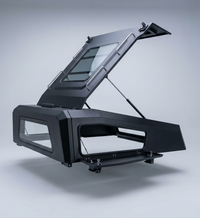 The Drift — aluminum hatchback canopy with combined glass rear and roof, lifted open